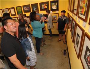 Family members at the Taking Shape exhibit 